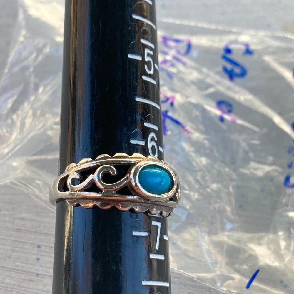 Sterling silver filigreed ring with blue stone gem